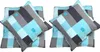 Two sets of bedding with a geometric pattern of squares in turquoise, light blue, gray, and dark gray. Produktbild-Vorschau