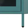 Close-up of the bottom corner of a teal metal cabinet with a black glass door and a metal leg. Náhled obrázku produktu