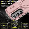 A pink phone case is shown with dramatic lighting and falling rocks to emphasize its ruggedness and protection features. Náhled obrázku produktu