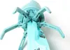 A teal-colored dog poop scooper with a bag attached, mounted on a white background. Produktbild-Vorschau