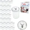 A set of glass jars with lids, a recipe book, and a decorative plate, all featuring a deer motif. Podgląd zdjęcia produktu
