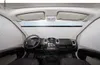 Interior view of a vehicle's dashboard with sunshades deployed. Anteprima dell’immagine prodotto