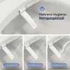 A close-up view of a bidet toilet seat with water jets demonstrating different spray modes. Podgląd zdjęcia produktu