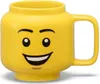A yellow LEGO head mug with a smiling face. Náhled obrázku produktu