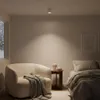 A bedroom scene with a chair and a bed. Náhľad obrázku produktu
