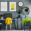 A home office setup with a desk, chair, computer, and decorative items. Podgląd zdjęcia produktu