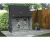 A bicycle is stored in a metal storage box in an outdoor setting. Náhľad obrázku produktu