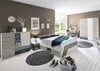 A modern bedroom set with a bed, wardrobe, desk, and storage units. Produktbild-Vorschau