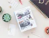 A Harry Potter photo album is displayed on a wooden desk, surrounded by various stationery items and plants. Anteprima dell’immagine prodotto