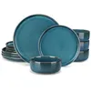 A set of teal-colored stoneware plates and bowls are neatly arranged against a white background. Náhled obrázku produktu