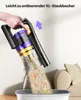 A hand is shown emptying a vacuum cleaner's dustbin into a trash can. Produktbild-Vorschau