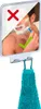 A mirror with a towel hanging from it, showing a man shaving. Anteprima dell’immagine prodotto