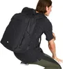 A man wearing a backpack. Voir les images du produit
