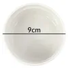 A top-down view of a white ceramic dish with a black line indicating its diameter and the text '9cm' next to it. Anteprima dell’immagine prodotto