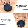 A collage showing two ways to play a steel tongue drum: with fingers and with mallets. Produktbild-Vorschau