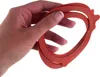 A hand holding a stack of red rubber gaskets. Anteprima dell’immagine prodotto