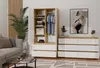 A bedroom or living room setting with a dresser and a wardrobe. Podgląd zdjęcia produktu