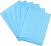 A stack of light blue disposable pads fanned out against a white background. Náhled obrázku produktu