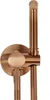 A close-up view of a bidet shower head and faucet. Produktbild-Vorschau