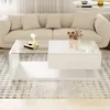 A modern living room scene with a white coffee table in front of a sofa. Voir les images du produit