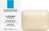 A product shot of a bar of soap next to its packaging. Podgląd zdjęcia produktu