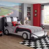 A child's bedroom decorated with a racing theme, featuring a car-shaped bed. Produktbild-Vorschau