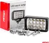 A product shot of an LED work lamp and its packaging, along with mounting hardware, against a white background. Produktbild-Vorschau