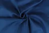 A close-up, swirled view of dark blue fabric. Produktbild-Vorschau