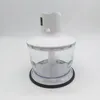 A white and clear hand blender attachment with blades inside a clear container sits on a white background. Produktbild-Vorschau