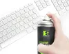 A hand holding a can of compressed air spray over a keyboard. Produktbild-Vorschau