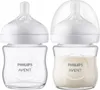 Two baby bottles, one empty and one filled with milk, are shown side-by-side against a white background. Anteprima dell’immagine prodotto
