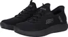 A pair of black Skechers shoes are shown from a slightly elevated side angle against a white background. Voir les images du produit