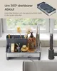 A kitchen sink organizer with various cleaning tools and a soap dispenser, with water flowing into the sink. Produktbild-Vorschau