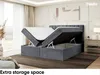 A bedroom scene with a bed that has storage space revealed. Produktbild-Vorschau