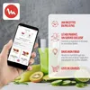 A hand holding a smartphone displaying a recipe app, with a blender and fresh ingredients in the background. Voir les images du produit