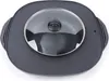 A top-down view of a black electric hot pot and grill with a clear glass lid. Voir les images du produit