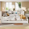 A bedroom scene with a bed, bookshelf headboard, and windows. Produktbild-Vorschau
