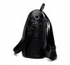 A black backpack shown from the side against a white background. Náhľad obrázku produktu