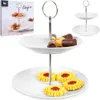 A two-tiered serving stand filled with pastries and cookies, presented against a white background. Anteprima dell’immagine prodotto