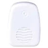 A white electronic device with a round sensor on top and a speaker grille at the bottom. Podgląd zdjęcia produktu