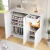 A white shoe cabinet with a drawer and open doors, displaying various shoes and boots, placed in a room with a window and a plant. Anteprima dell’immagine prodotto