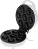 An open donut maker with multiple donut molds. Podgląd zdjęcia produktu