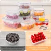 A collage of images showing food storage containers filled with various foods, and separate images of tomatoes and grapes. Náhled obrázku produktu