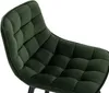 Close-up view of the tufted seat of a dark green velvet bar stool. Náhľad obrázku produktu