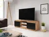 A modern living room setup with a TV stand, television, couch, and floor lamp. Voir les images du produit