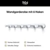 A white wall-mounted coat rack with six hooks is shown against a white background. The product is branded TOJ LIVING. Produktbild-Vorschau