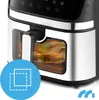 A close-up view of an air fryer with a chicken inside, showing the interior and control panel. Produktbild-Vorschau