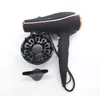 A black hairdryer with rose gold accents and its accessories (diffuser and concentrator nozzle) are displayed against a white background. Podgląd zdjęcia produktu
