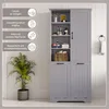 A grey bathroom cabinet with open shelves and two lower doors, next to a potted plant and a towel rack with a towel. The image includes informational text overlays on the left. Náhľad obrázku produktu