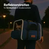 A person is walking at night with a dog carrier bag over their shoulder. The bag has reflective strips. Anteprima dell’immagine prodotto